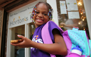 Young girl outside Horton's Kids