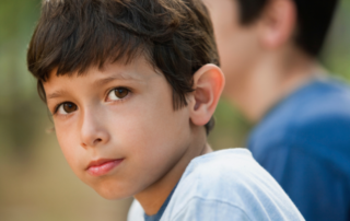 Young boy looking serious